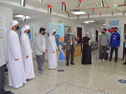 GR-12-Boys giving donation at Sharjah City for HumanitarianServices